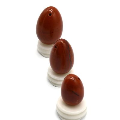La pierre rouge est utilisée pour le massage vaginal, le massage yoni, l'exercice Kegel, les œufs de jade pour les femmes, pour améliorer la santé du plancher pelvien.
