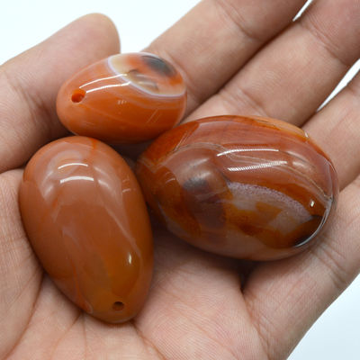 Caractéristique régionale Yoni Egg Carnelian et Red Jade Egg pour l'exercice vaginal 45*30mm