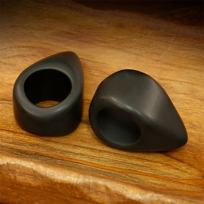 Natural Black Bian Stone Gua Sha Massage Ring pour tout le corps Massage manuel à l'acupuncteur Massage à la main et au pied