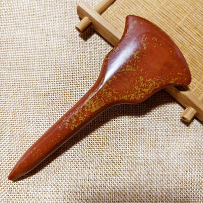 Découvrez les bienfaits curatifs du massage complet du corps et de la stimulation des points d'acupuncture avec le tableau Gua Sha de la pierre Bian rouge