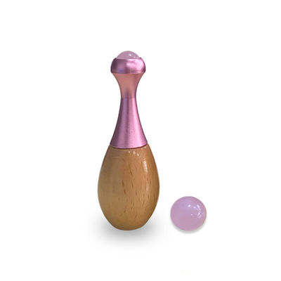 Rouleau de massage en bois à manche de jade, bâton de massage facial Gua Sha et outils de soins oculaires pour favoriser l'absorption de la crème oculaire