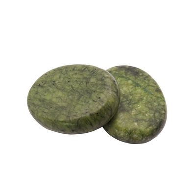 Des pierres chaudes naturelles à la guérison au Jade Xiuyan pour un massage professionnel et une relaxation au spa.