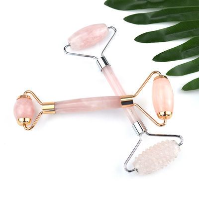 Logo personnalisé Disponibled Natural Rose Quartz Gold Handle Facial Jade Roller Pink Crystal Massager Pour le traitement de beauté de la peau