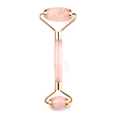 Logo personnalisé Disponibled Natural Rose Quartz Gold Handle Facial Jade Roller Pink Crystal Massager Pour le traitement de beauté de la peau