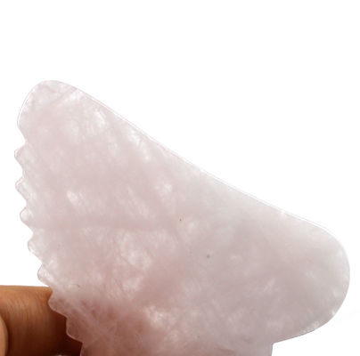 Tableau de massage du visage à la main en forme de rose de quartz