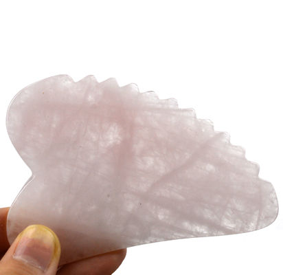 Tableau de massage du visage à la main en forme de rose de quartz