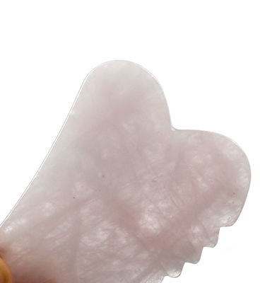 Tableau de massage du visage à la main en forme de rose de quartz