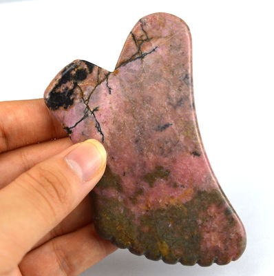 Outil de massage naturel de la rhodonite Gua Sha pour resserrer la peau et promouvoir la beauté du visage