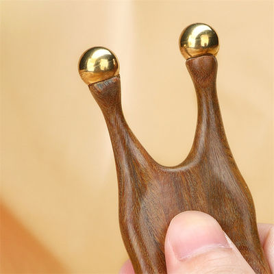 Outil de massage Gua Sha en bois de santal de cuivre pur pour la stimulation du visage et des yeux