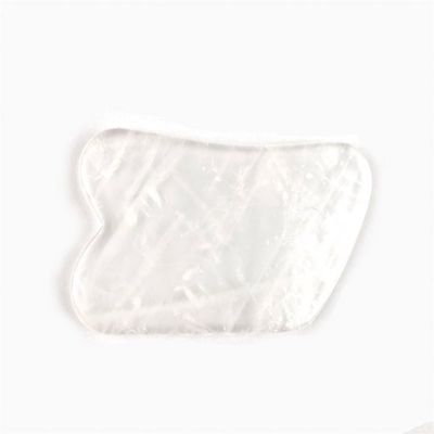 Outil de massage facial Quartz clair Outil de grattage Gua Sha pour le traitement SPA et l'acupuncture