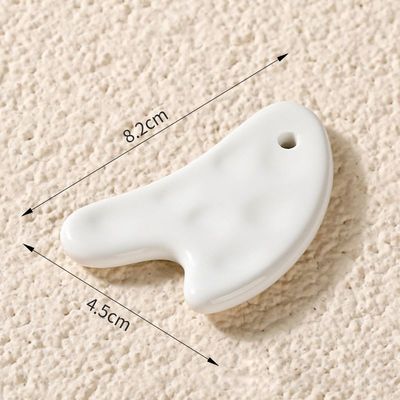 Découvrez les bienfaits de l'outil en céramique Gua Sha