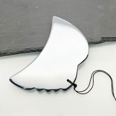 Plaque de beauté en argent Terahertz, outil de massage pour une expérience luxueuse et rajeunissante