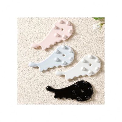 Découvrez le pouvoir curatif du peigne en céramique Gua Sha pour le massage du visage et du corps