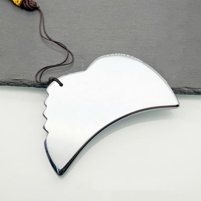 Plaque de beauté en argent Terahertz, outil de massage pour une expérience luxueuse et rajeunissante