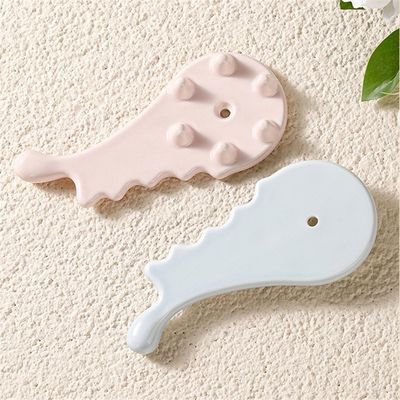Découvrez le pouvoir curatif du peigne en céramique Gua Sha pour le massage du visage et du corps