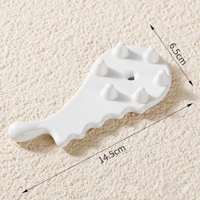 Découvrez le pouvoir curatif du peigne en céramique Gua Sha pour le massage du visage et du corps