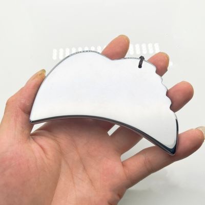 Massage du visage Terahertz Gua Sha Massage Outil de grattage Spa de beauté Massageur de soins de santé Aile forme Terahertz Produit