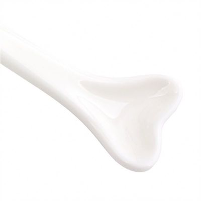 Meridiens faciaux en céramique blanche efficaces pour le dragage du bâton d'acupuncture pour les outils de soins oculaires