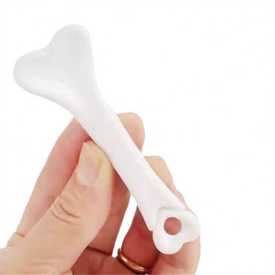 Meridiens faciaux en céramique blanche efficaces pour le dragage du bâton d'acupuncture pour les outils de soins oculaires