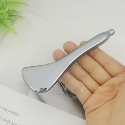 Tableau Gua Sha à double tête Terahertz pour la stimulation des points d'acupuncture et le décapage du méridien facial