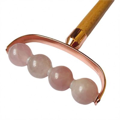 Masseur facial portable rose quartz à tête unique anti-rides rouleau de poignée en bois