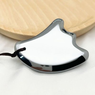 Massageur facial en forme d'aile Terahertz Plaque de rasage Équipement de massage corporel pour table de massage face lifting