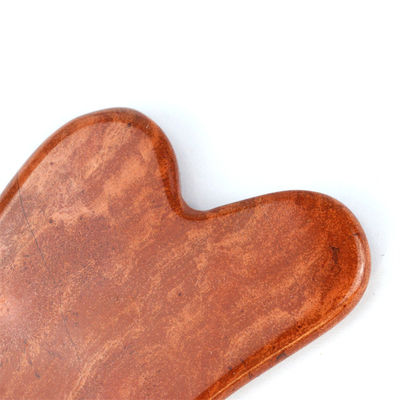 Massageur naturel en forme de cœur Jaspe rouge Gua Sha Scraping Board pour la beauté du visage et le soin de la peau