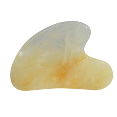 Tableau de grattage en forme de cœur naturel jaune citrine gua sha pour l'instrument de massage du visage et du corps
