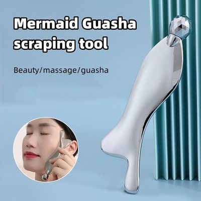 Logo personnalisé Disponible en forme de poisson Plaque de grattage en alliage de zinc mince minceur du visage rouleau des yeux en acier inoxydable outil de massage Guasha
