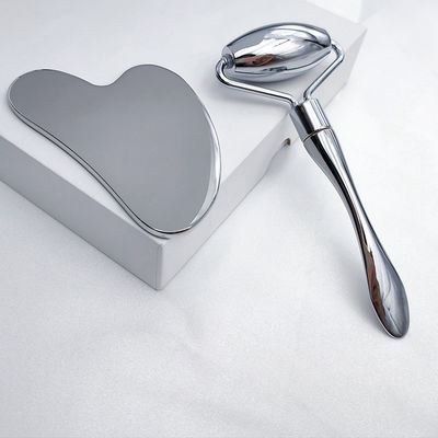 Équipement de massage Logo personnalisé disponibled Anti-âge Argent 304 acier inoxydable Métal Gua Sha Face Roller Crème pour les yeux Stick