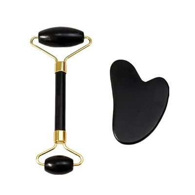 Un grattoir pour le corps personnalisé avec un logo disponible. Un rouleau de massage facial en pierre blanche noire naturelle. Un rouleau de massage en jade noir.