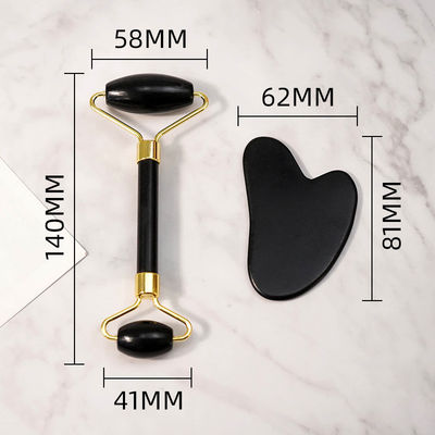 Un grattoir pour le corps personnalisé avec un logo disponible. Un rouleau de massage facial en pierre blanche noire naturelle. Un rouleau de massage en jade noir.