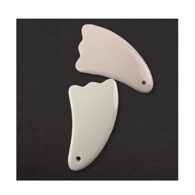 La planche de massage en céramique Guasha est le choix ultime pour les soins du visage et du corps.