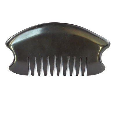 Le peigne chinois de pierre Bian Gua Sha est disponible pour le massage du cuir chevelu