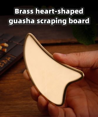 Équipement de massage personnalisable en cuivre pur Corps en forme de cœur Soins de santé Guasha Scraping Board Couleur or Laiton métal Gua Sha Outil de massage