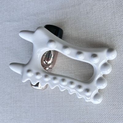 Logo personnalisé disponibleoutil de massage en céramique portable pour les produits de soins de santé