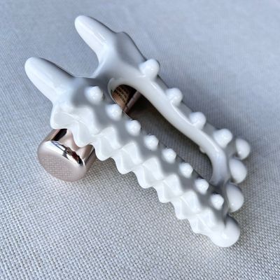 Logo personnalisé disponibleoutil de massage en céramique portable pour les produits de soins de santé