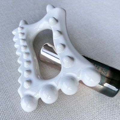 Logo personnalisé disponibleoutil de massage en céramique portable pour les produits de soins de santé