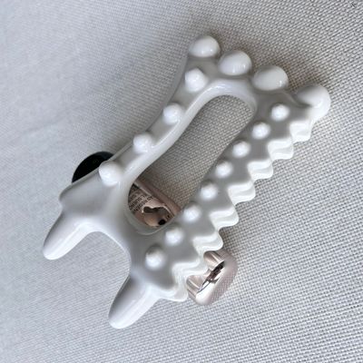 Logo personnalisé disponibleoutil de massage en céramique portable pour les produits de soins de santé