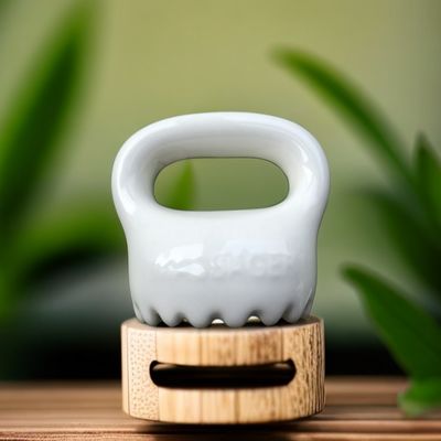 Relaxant le corps et le visage Le cuir chevelu Soins de santé personnels Outil de grattage de Gua Sha en céramique microcristalline avec logo personnalisé