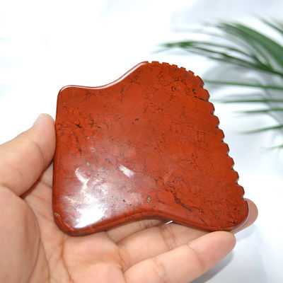 Propriétés du masseur Jaspe rouge naturel Gua Sha Outil de massage facial
