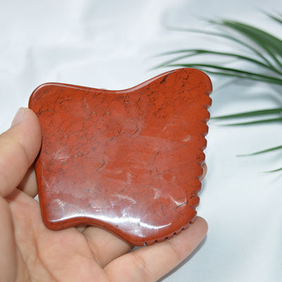 Propriétés du masseur Jaspe rouge naturel Gua Sha Outil de massage facial