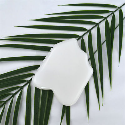 Propriétés de l'équipement de massage corporel naturel de jade blanc de pierre blanche Gua Sha outil de grattage pour le massage de soins de santé du corps