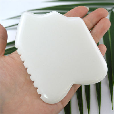 Propriétés de l'équipement de massage corporel naturel de jade blanc de pierre blanche Gua Sha outil de grattage pour le massage de soins de santé du corps