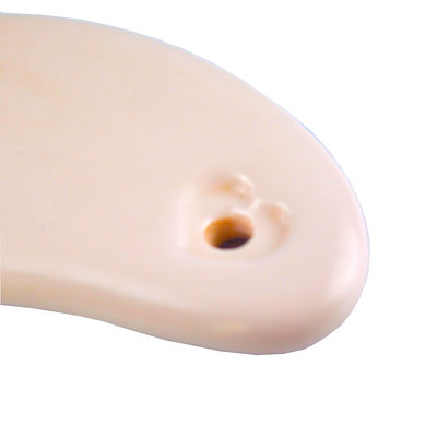 La planche à gratter en céramique en forme de cœur est l'outil idéal pour le massage corporel et le rajeunissement du visage.