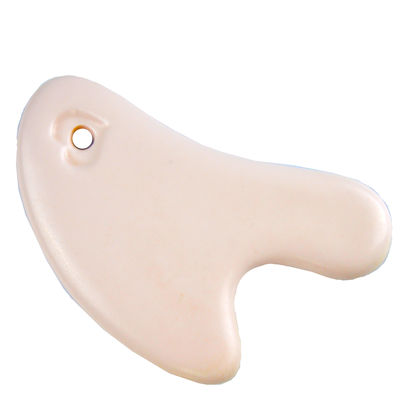 La planche à gratter en céramique en forme de cœur est l'outil idéal pour le massage corporel et le rajeunissement du visage.