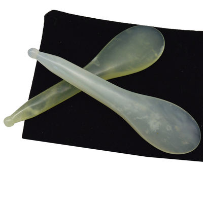 Un stylo de massage en point d'acupuncture en forme de cuillère jaune Xiuyan Jade Stick Eye Massager Pen avec et accepté service OEM / ODM