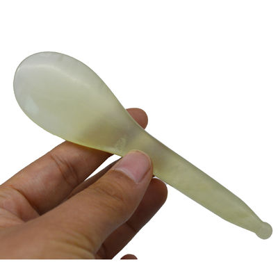 Un stylo de massage en point d'acupuncture en forme de cuillère jaune Xiuyan Jade Stick Eye Massager Pen avec et accepté service OEM / ODM