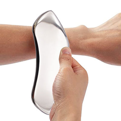 Masseur facial outil de grattage en acier inoxydable portatif pour le traitement SPA