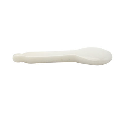 Un bâton de massage Gua Sha en jade blanc pour le massage facial et le point d'acupuncture